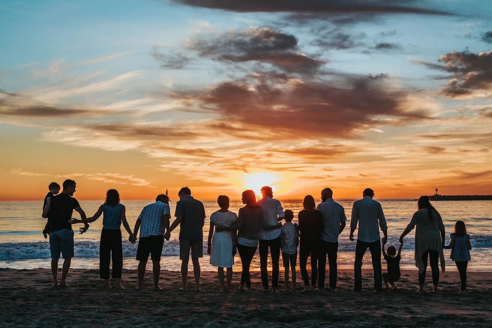 Multi-generational family together outdoors representing family protection and legacy planning